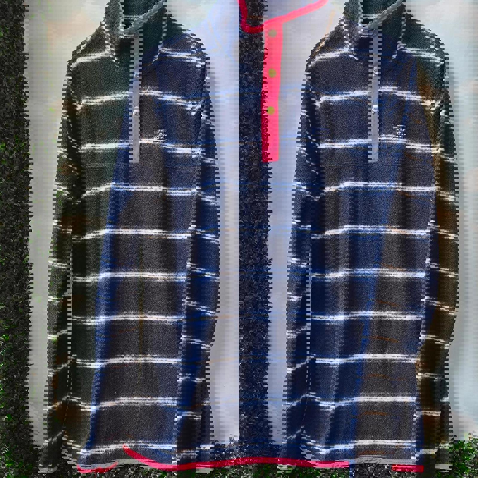 Navy and white striped quarter zip fleece with pink accents