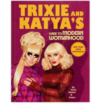 Book cover of 'Trixie and Katya's Guide to Modern Womanhood' with two women on a purple background.