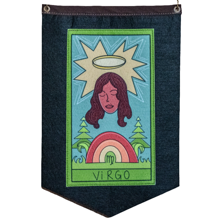 Felt banner with a colorful illustration of a woman with a halo, trees, and a rainbow, labeled 'Virgo'.