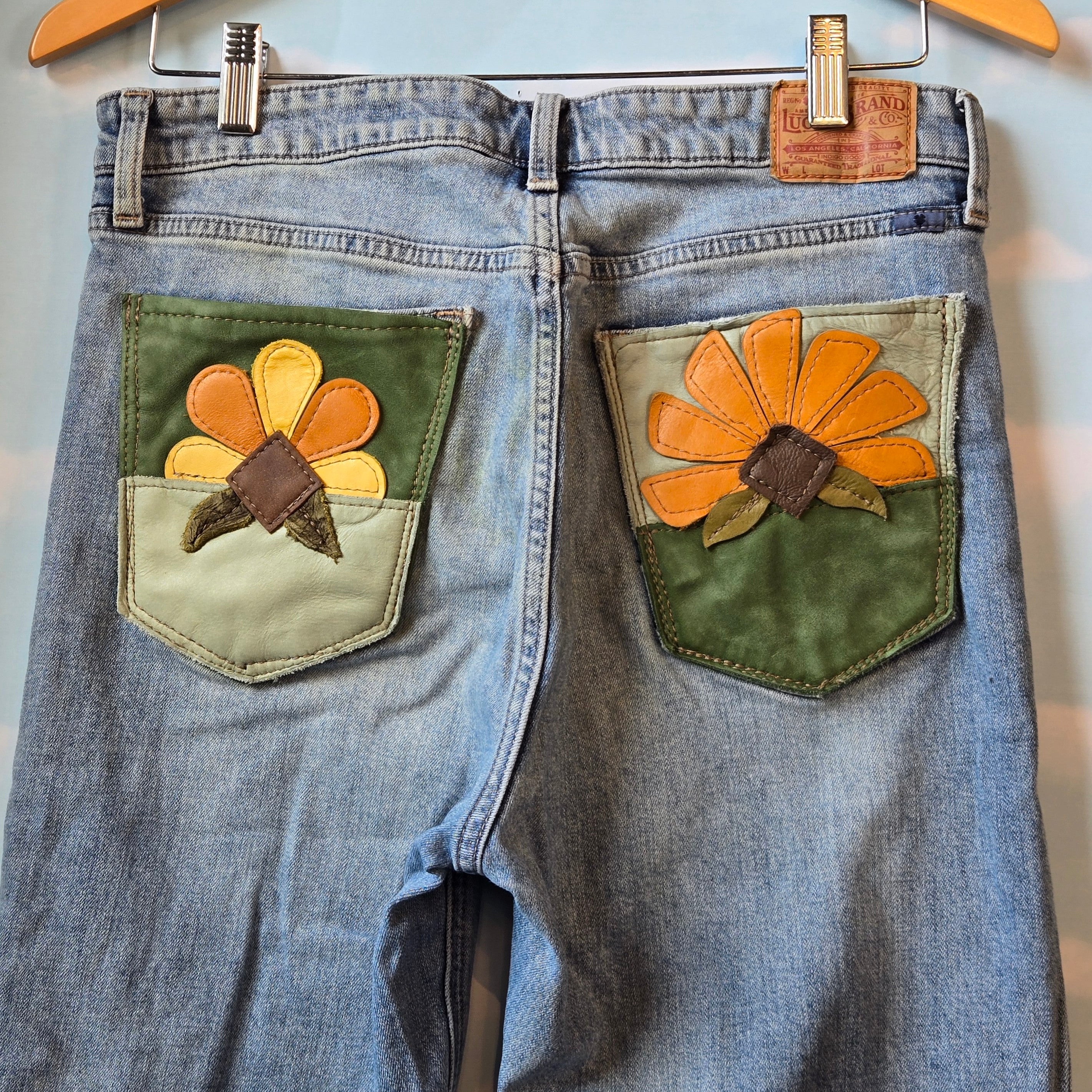 Flower Power Upcycled Denim * waist size 30 * Lucky Brand Flare Jeans * Leather Sunflower Back Pocket Detail