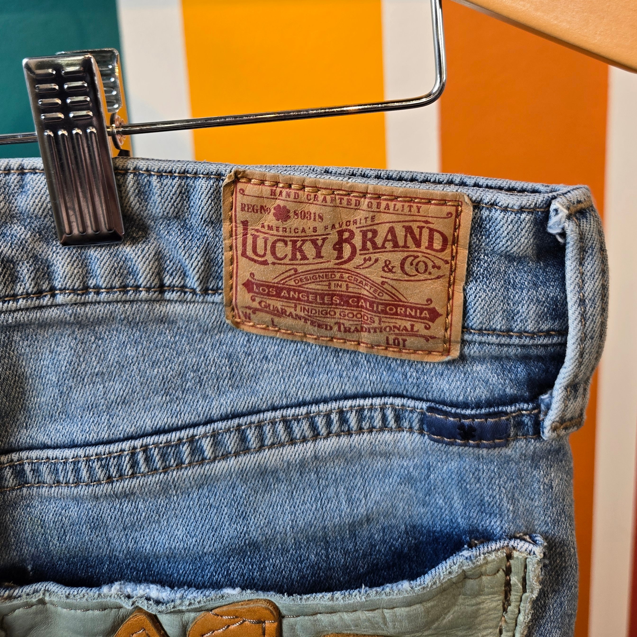 Flower Power Upcycled Denim * waist size 30 * Lucky Brand Flare Jeans * Leather Sunflower Back Pocket Detail